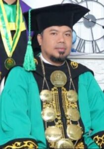 Prof. Dr. Muhammad Nazaruddin, M.Si., seorang ahli sosiologi politik dan kebijakan dari Universitas Malikussaleh Lhokseumawe,